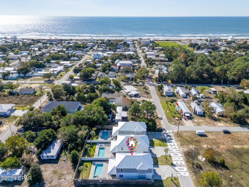 Welcome to 326 E Lakeshore Drive, a newly built luxury 5 Bed / 4 - Beach Home for sale in Panama City Beach, Florida on Beachhouse.com