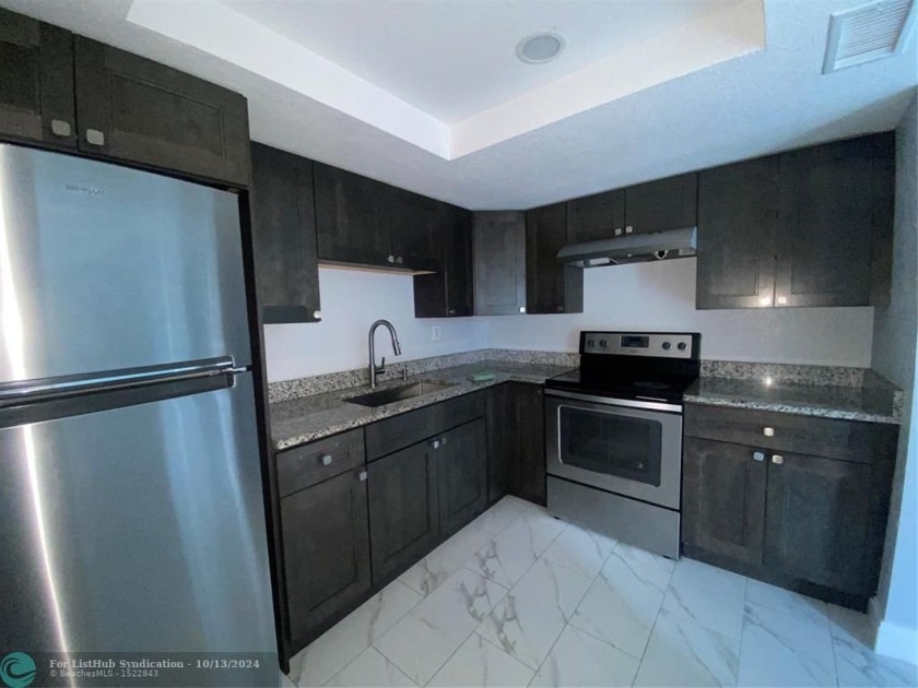 Located just of of US 441, This fully remodeled unit features a - Beach Condo for sale in Pompano Beach, Florida on Beachhouse.com