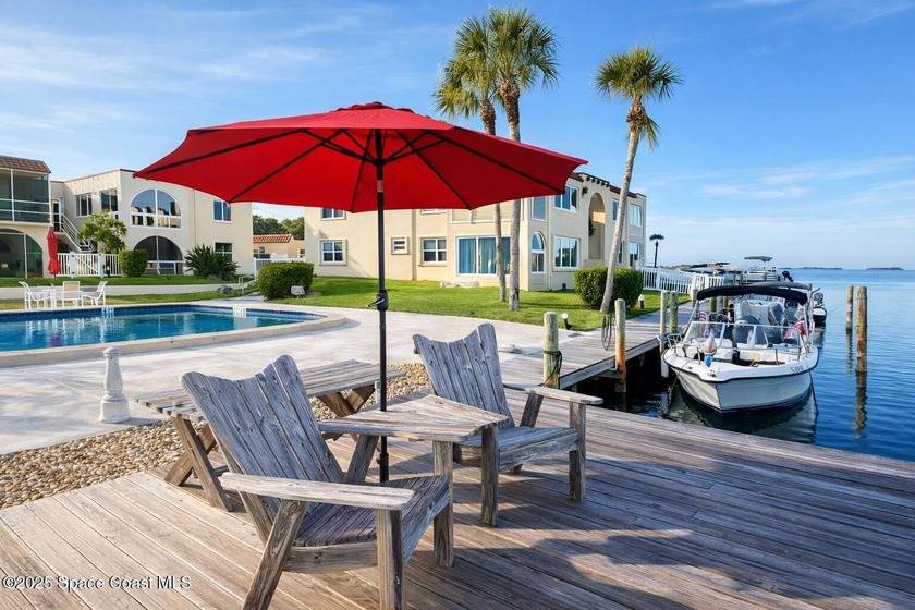 Direct riverfront, boat slips available, and a pool on the - Beach Condo for sale in Cocoa Beach, Florida on Beachhouse.com