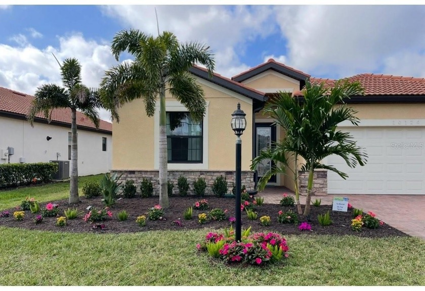 Behind the gates of Rosedale Golf & Country Club, this - Beach Home for sale in Bradenton, Florida on Beachhouse.com