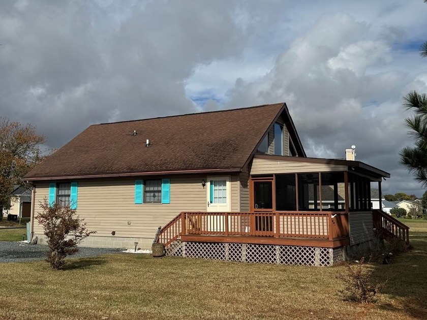 This beautiful home is ideally located in the heart of Captain's - Beach Home for sale in Greenbackville, Virginia on Beachhouse.com