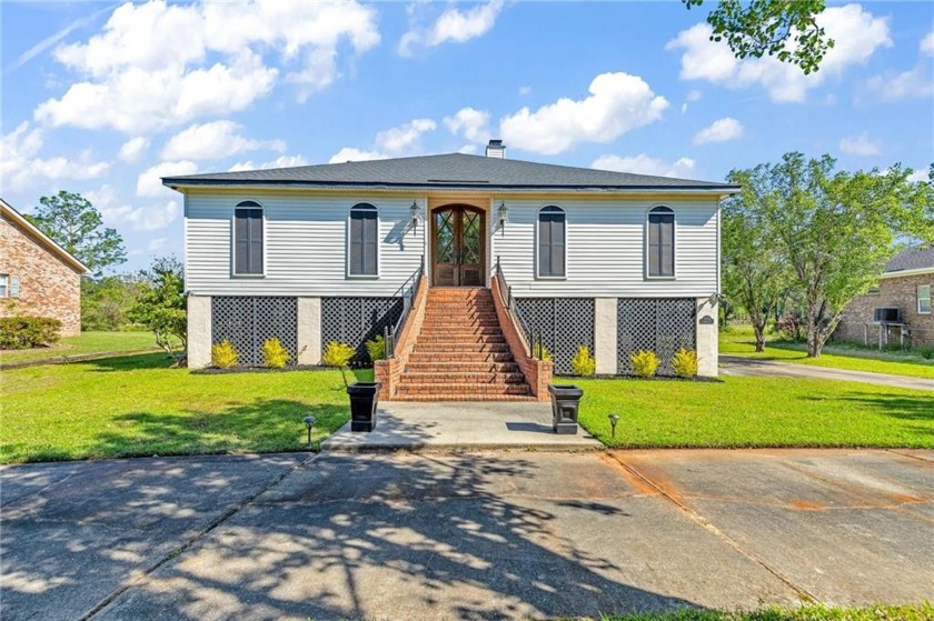 Welcome to 3828 St Andrews Loop N, where luxury meets waterfront - Beach Home for sale in Mobile, Alabama on Beachhouse.com