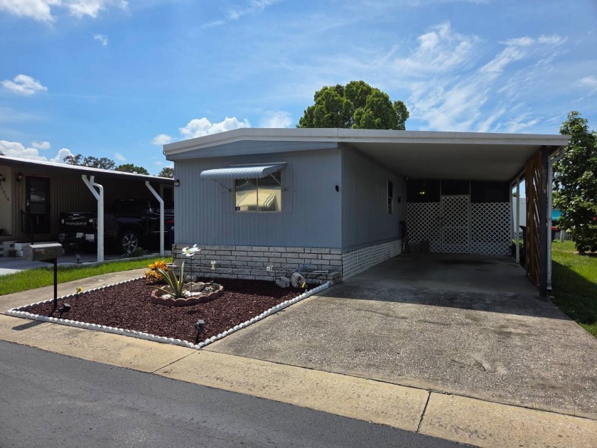 This 2 bed 1 bath home is located in Sunshine Lake Estates a 55 - Beach Home for sale in New Port Richey, Florida on Beachhouse.com