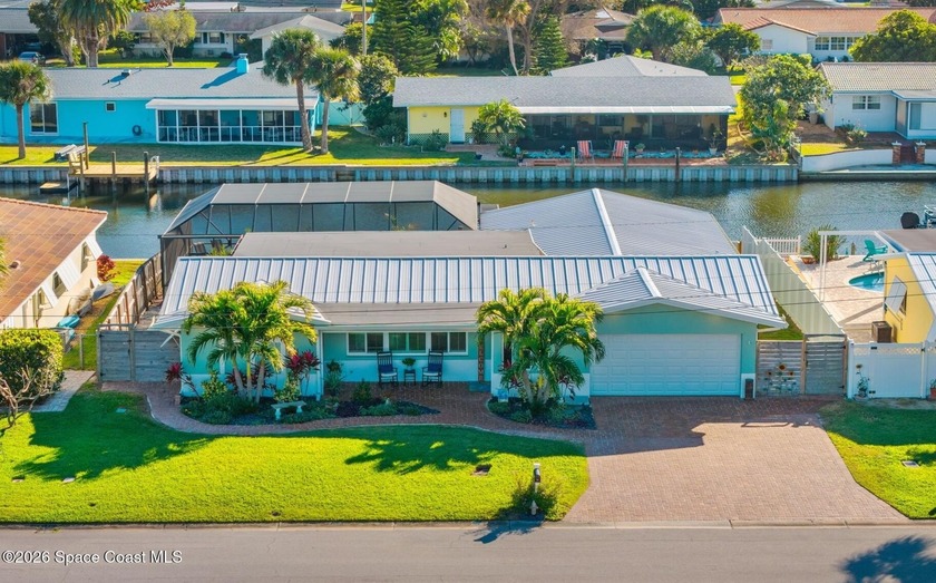 Exceptional canal front living in the heart of Cocoa Beach! This - Beach Home for sale in Cocoa Beach, Florida on Beachhouse.com