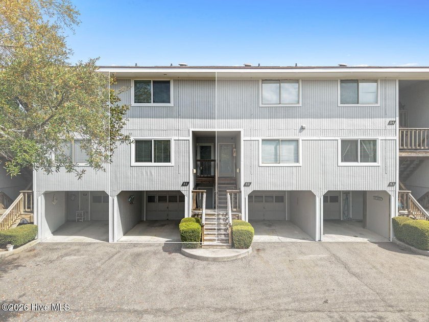 Tucked inside Caswell Dunes, a sought-after coastal golf course - Beach Condo for sale in Caswell Beach, North Carolina on Beachhouse.com
