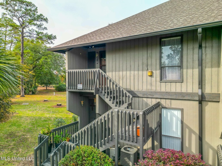 Enjoy the golf course view from your balcony of this lovely - Beach Condo for sale in Diamondhead, Mississippi on Beachhouse.com