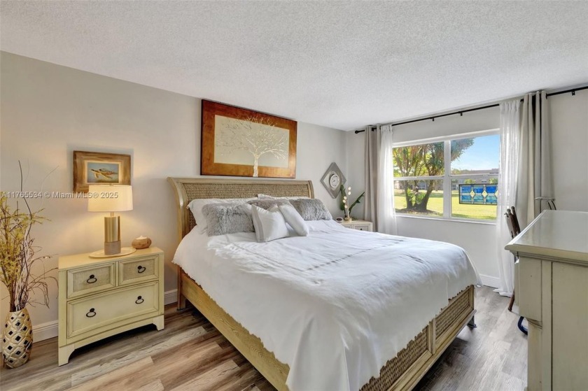 Stunning 1-bedroom, 1.5-bathroom ground-floor unit with a - Beach Condo for sale in Sunrise, Florida on Beachhouse.com