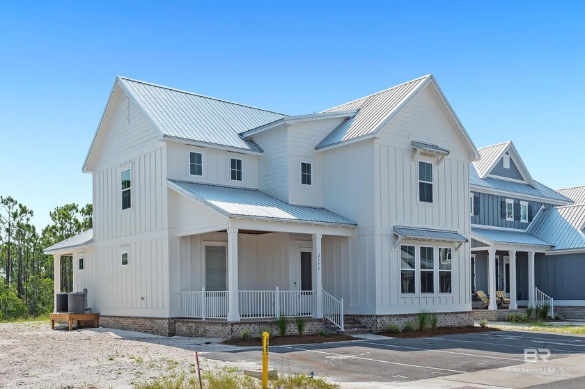 Step into the epitome of classy coastal living with this - Beach Home for sale in Orange Beach, Alabama on Beachhouse.com