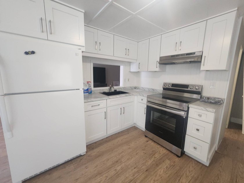 Welcome to this absolutely gorgeous manufactured home in a - Beach Home for sale in Pinellas Park, Florida on Beachhouse.com