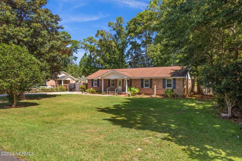 Close to where the blacktop ends, centrally located to the - Beach Home for sale in Shallotte, North Carolina on Beachhouse.com