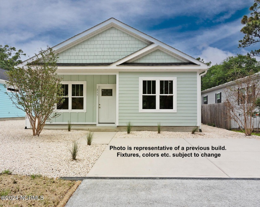 New construction Coastal Cottage in Oak Island on a street with - Beach Home for sale in Oak Island, North Carolina on Beachhouse.com