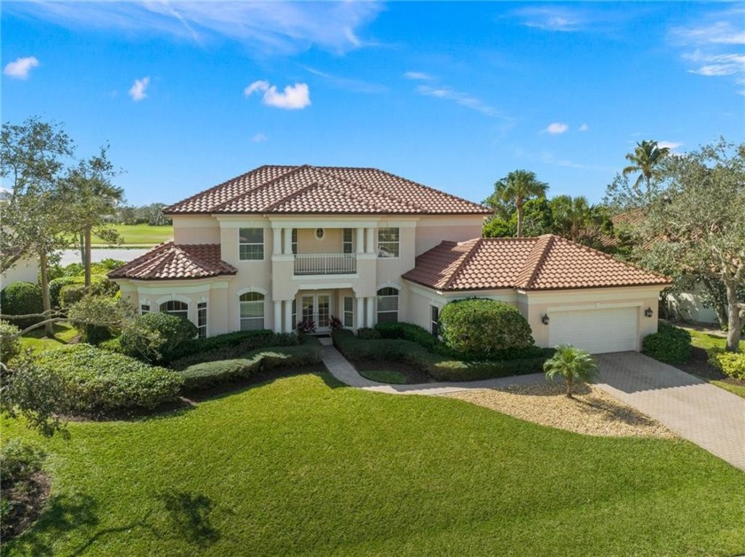 Walk into sweeping views of the golf course & lake in this - Beach Home for sale in Vero Beach, Florida on Beachhouse.com
