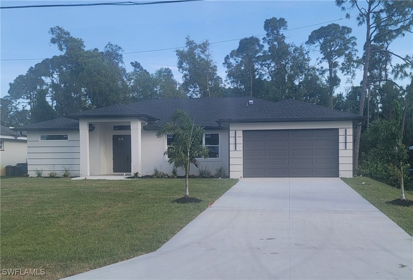 NEW CONSTRUCTION! Brand New 1 of Kind Custom Home. This home - Beach Home for sale in Lehigh Acres, Florida on Beachhouse.com