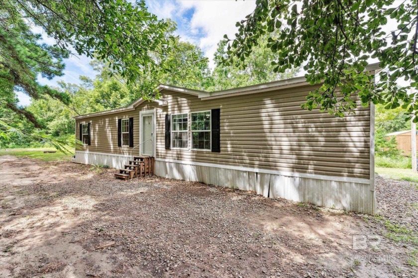 Experience country living at its best with this delightful oasis - Beach Home for sale in Fairhope, Alabama on Beachhouse.com