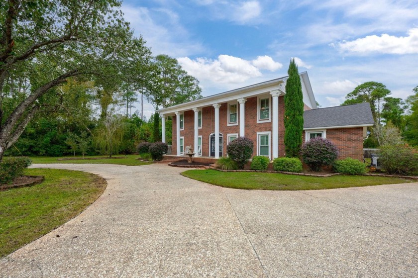 This stunning 6-bedroom, 4-bathroom colonial-style estate has - Beach Home for sale in Gulf Breeze, Florida on Beachhouse.com