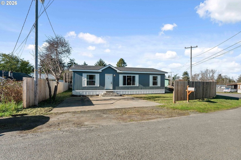 This beautifully, move-in-ready home offers three bedrooms, two - Beach Home for sale in Coos Bay, Oregon on Beachhouse.com
