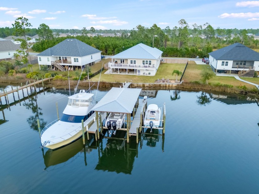 Discover 353 Confidence Way, a stunning waterfront retreat that - Beach Home for sale in Southport, Florida on Beachhouse.com