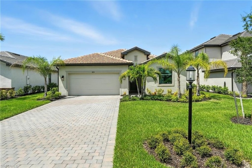 Welcome to 18514 Ives Drive! A beautifully upgraded Marsala - Beach Home for sale in Estero, Florida on Beachhouse.com