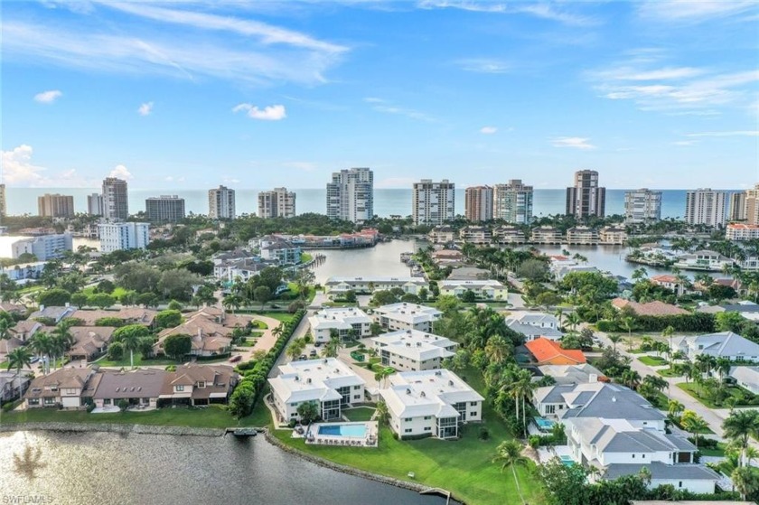 Experience unparalleled lakefront living in this Parkshore condo - Beach Home for sale in Naples, Florida on Beachhouse.com