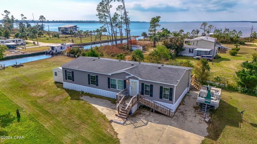 Welcome to this stunning 3-bedroom, 2-bathroom home nestled on a - Beach Home for sale in Southport, Florida on Beachhouse.com