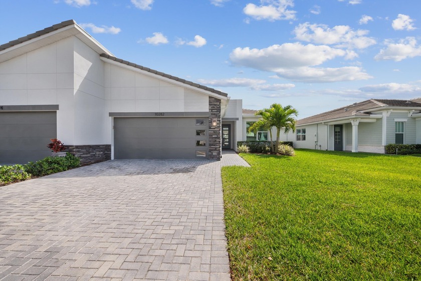 Located in the GATED Telaro at Southern Grove, this NEWER - Beach Home for sale in Port Saint Lucie, Florida on Beachhouse.com