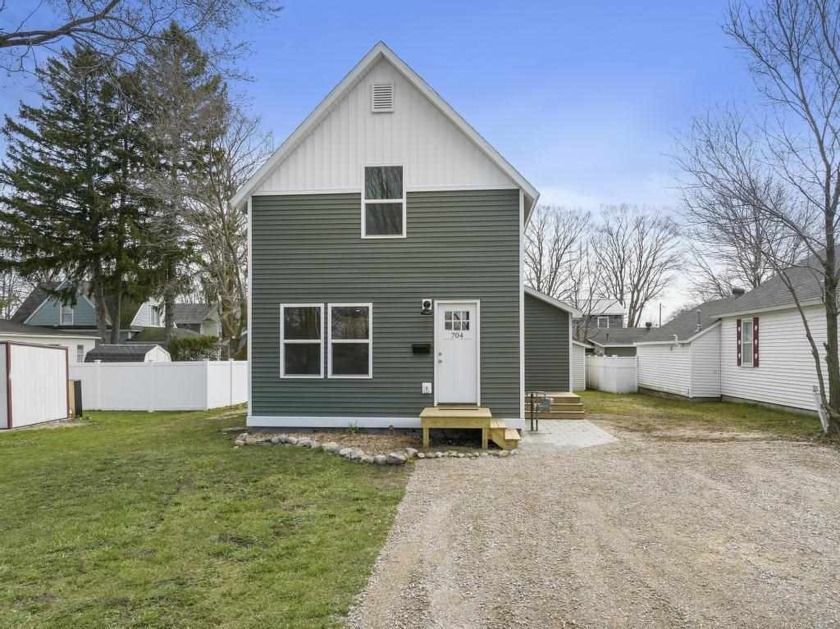 The perfect blend of modern upgrades and a convenient location - Beach Home for sale in Charlevoix, Michigan on Beachhouse.com