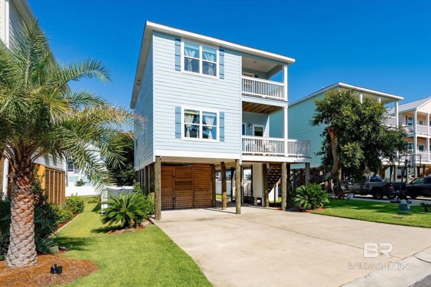 Welcome to this stunning waterfront home, a true hidden gem - Beach Home for sale in Gulf Shores, Alabama on Beachhouse.com