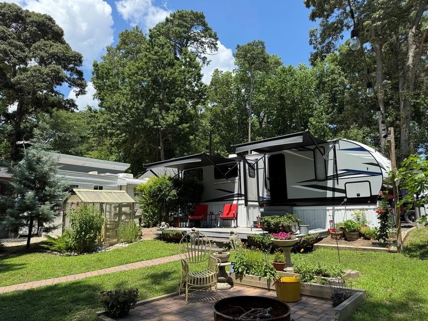 Nice corner lot with septic.  2022 one bedroom camper in - Beach Lot for sale in Horntown, Virginia on Beachhouse.com