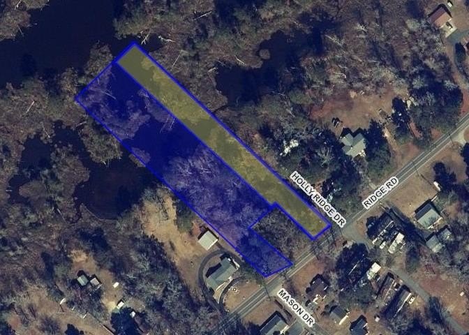 Discover an extraordinary opportunity to own a generous two-acre - Beach Acreage for sale in Chincoteague Island, Virginia on Beachhouse.com