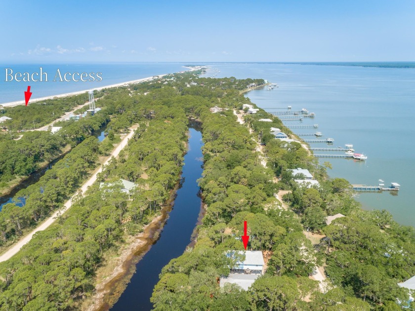 Immerse yourself in coastal living at this canal-front home on - Beach Home for sale in Alligator Point, Florida on Beachhouse.com