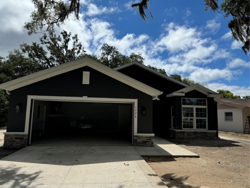 AMAZING BRAND NEW BUILD. 3/2/2.  ON A BEAUTIFUL LOT WITH A VIEW - Beach Home for sale in New Port Richey, Florida on Beachhouse.com