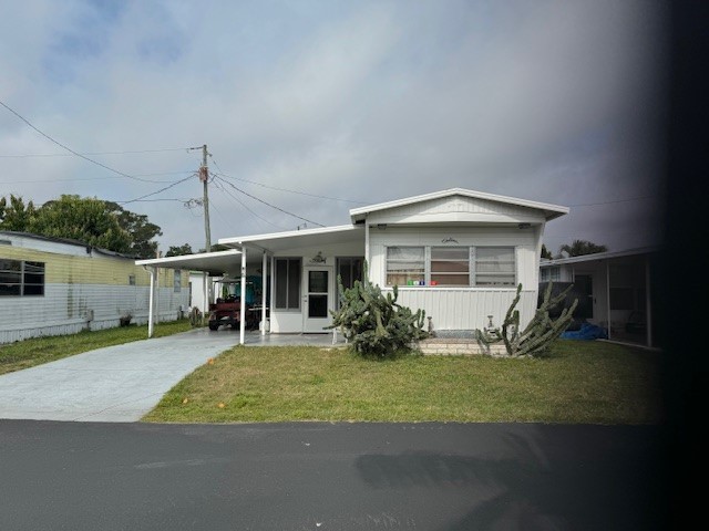 This 1964 Florida Style Mobile Home is located inside Kastaway - Beach Home for sale in Bradenton, Florida on Beachhouse.com
