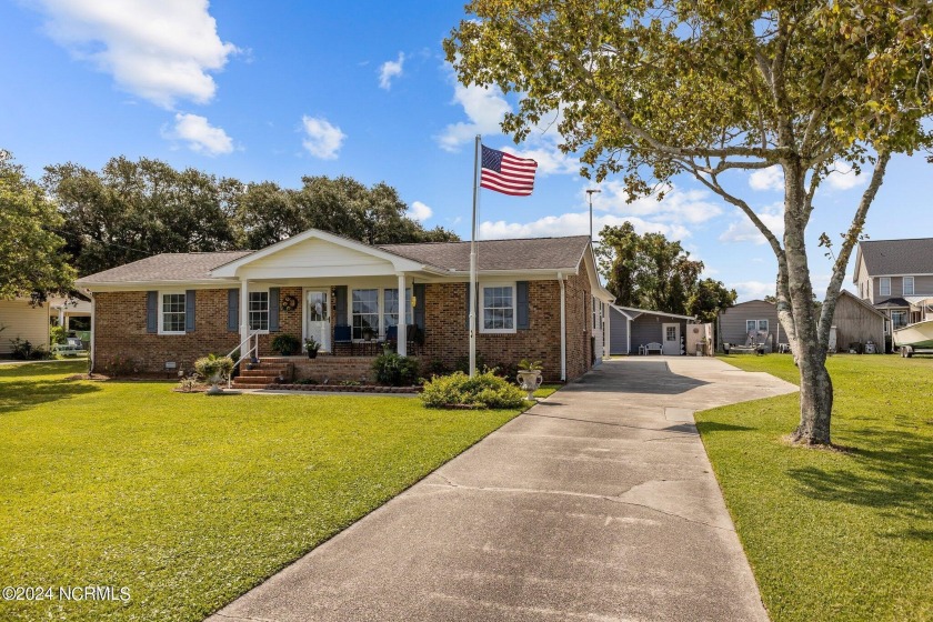 Lovingly maintained brick home with water views. Step up to the - Beach Home for sale in Harkers Island, North Carolina on Beachhouse.com