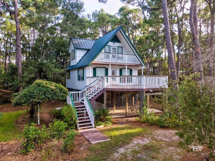 Fall in love with this cozy three bedroom, two bath home tucked - Beach Home for sale in Dauphin Island, Alabama on Beachhouse.com