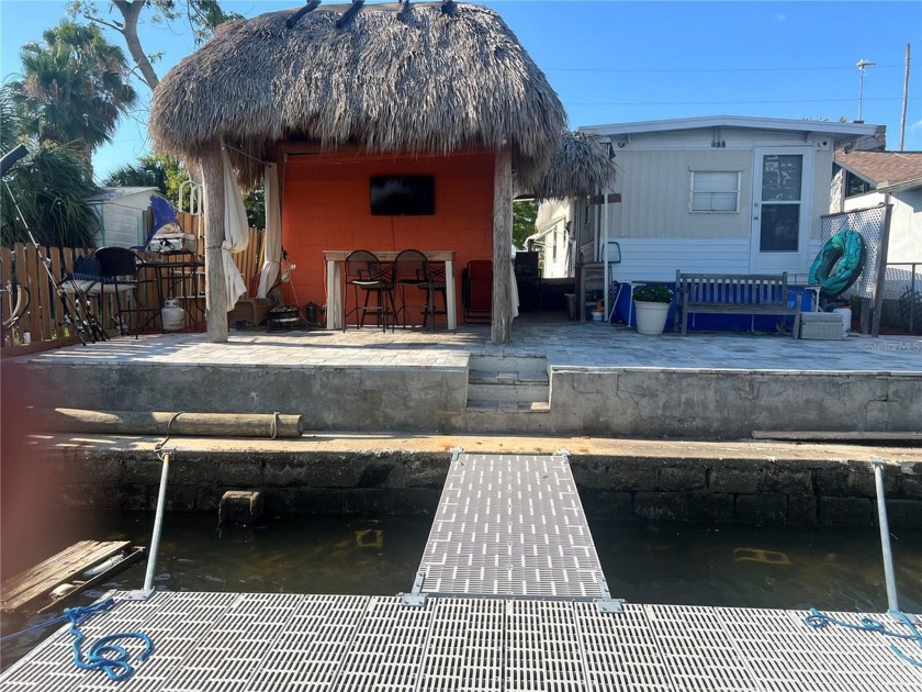 AMAZING CANAL WATERFRONT HOME has 2 bedrooms, 2 full bathrooms - Beach Home for sale in Hudson, Florida on Beachhouse.com