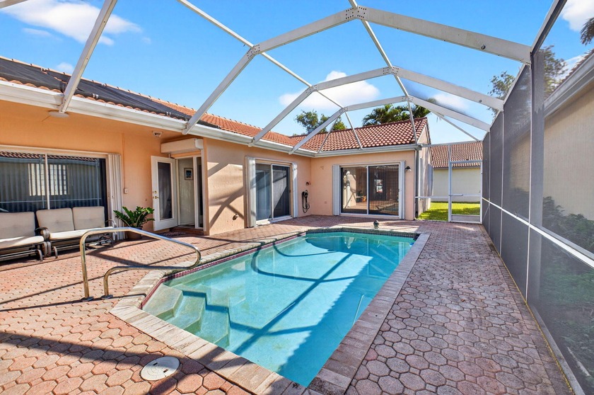 Step into this well maintained single-family courtyard home - Beach Home for sale in Boynton Beach, Florida on Beachhouse.com