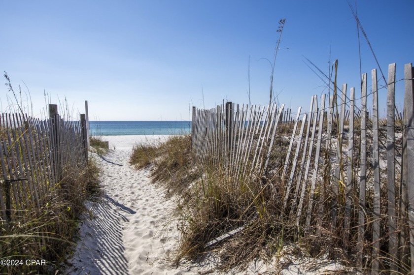 Tucked in the peaceful charm of Sugar Beach Condo, this - Beach Condo for sale in Panama City Beach, Florida on Beachhouse.com