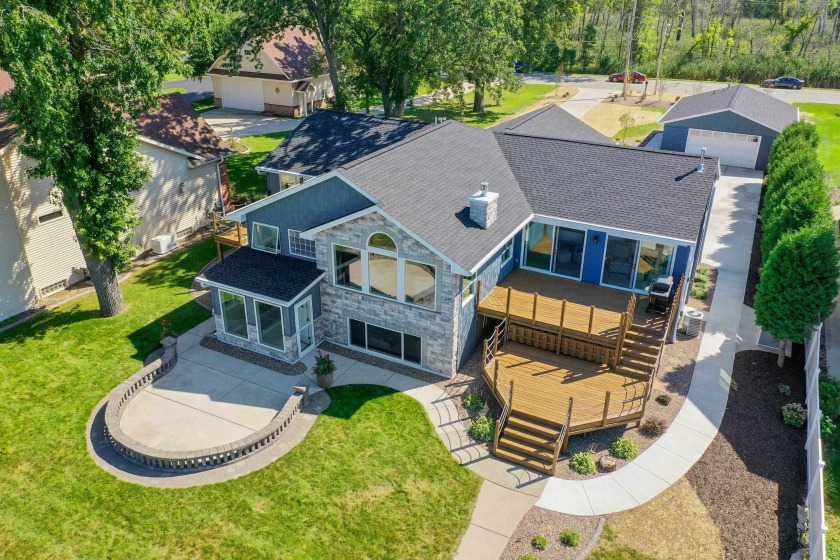 Enjoy stunning water views in this open concept CUSTOM Bay-Front - Beach Home for sale in Green Bay, Wisconsin on Beachhouse.com