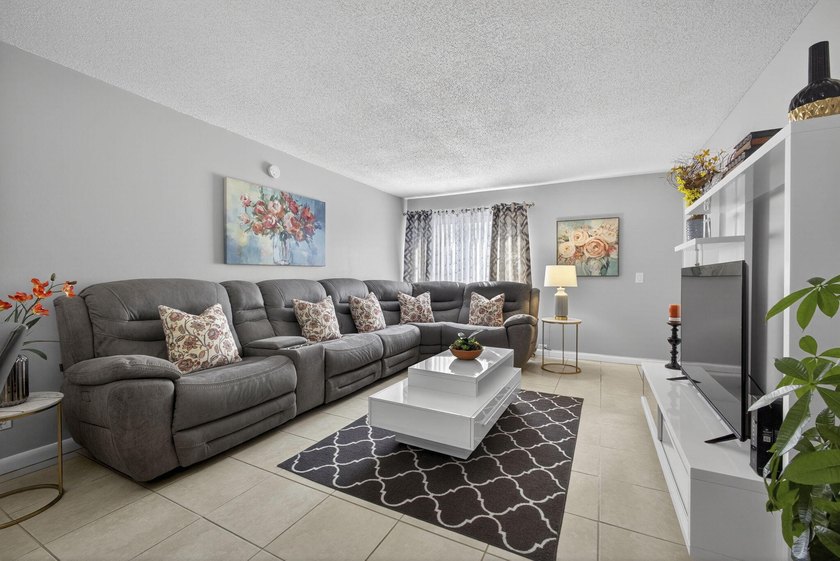 Welcome to this charming first-floor 1BR/1.5BA condo with - Beach Condo for sale in Royal Palm Beach, Florida on Beachhouse.com