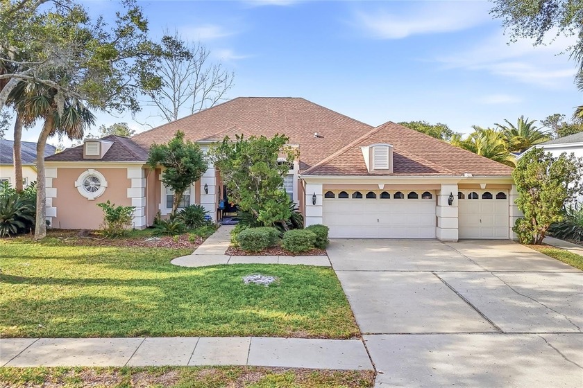Welcome home to this beautifully maintained 4-bedroom - Beach Home for sale in Palm Harbor, Florida on Beachhouse.com