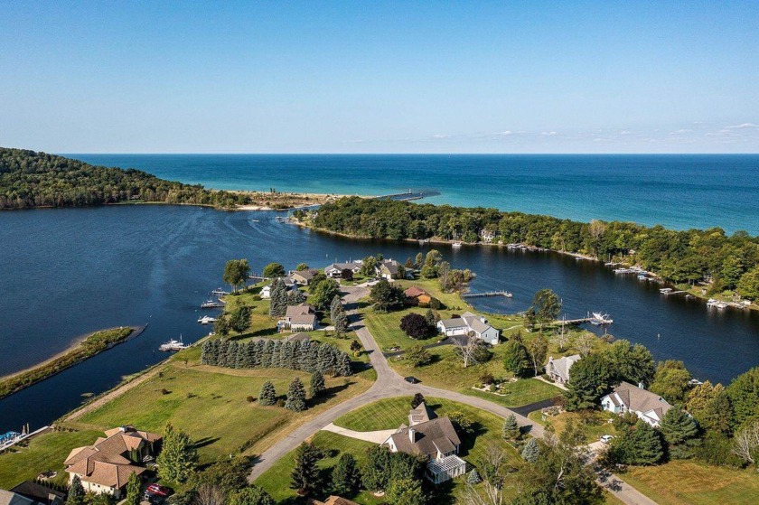 Experience 100 feet of breathtaking lake frontage on pristine - Beach Lot for sale in Arcadia, Michigan on Beachhouse.com