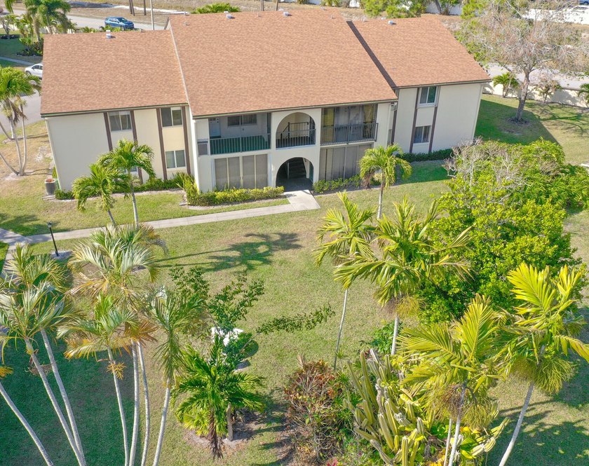 A charming winter retreat with classic Old Florida appeal. This - Beach Condo for sale in Greenacres, Florida on Beachhouse.com
