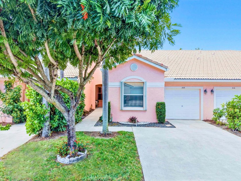 This well-maintained, move-in ready 2 bedroom villa is nestled - Beach Home for sale in Delray Beach, Florida on Beachhouse.com