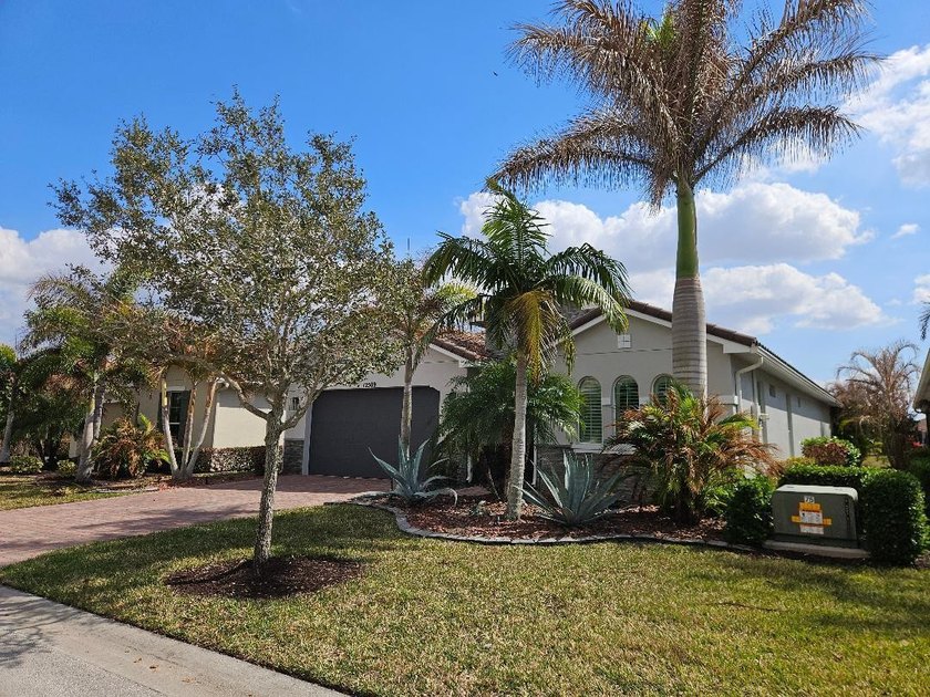 This is truly a MUST-SEE LAKEFRONT luxury home which shows like - Beach Home for sale in Port Saint Lucie, Florida on Beachhouse.com
