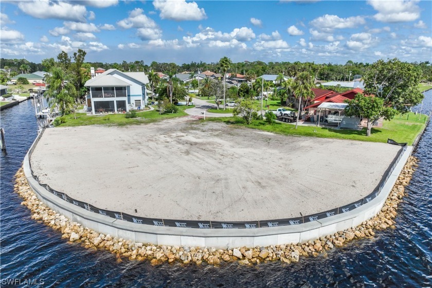 Discover the epitome of waterfront living on this breathtaking - Beach Lot for sale in North Fort Myers, Florida on Beachhouse.com