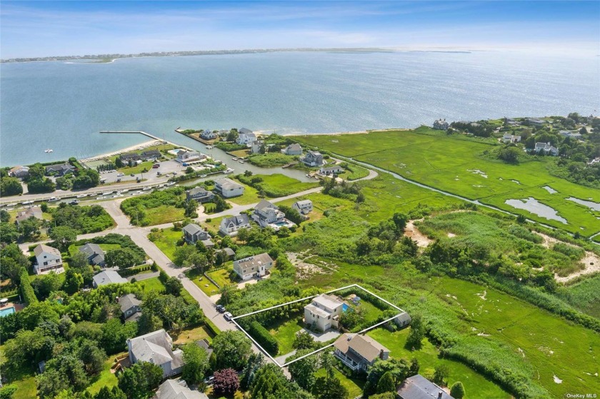 Discover coastal living in Remsenburg. This expansive 2,100+ - Beach Home for sale in Remsenburg, New York on Beachhouse.com