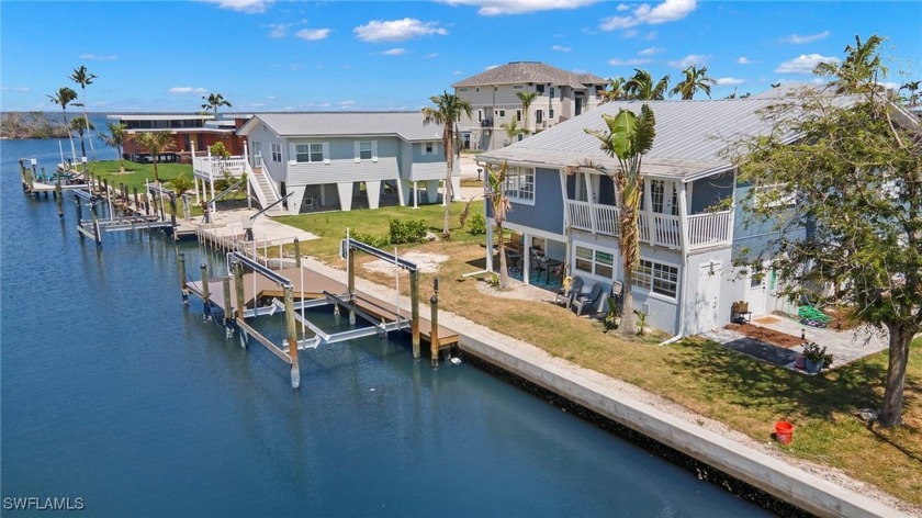 Escape to paradise in this charming canal front Elevated oasis - Beach Home for sale in Fort Myers Beach, Florida on Beachhouse.com