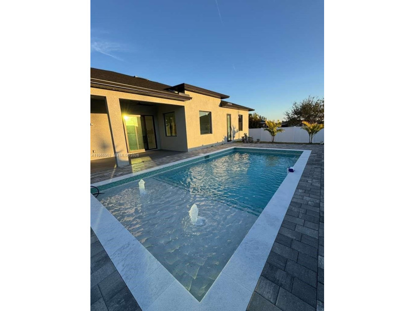 Brand-new construction in Cape Coral! This beautifully designed - Beach Home for sale in Cape Coral, Florida on Beachhouse.com