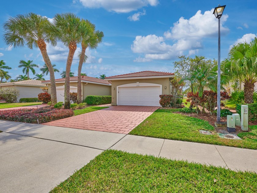 Set within the gates of the highly sought-after active adult - Beach Home for sale in Boynton Beach, Florida on Beachhouse.com