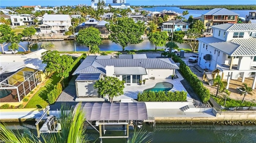 A Rare Coastal Gem | Dual Water Views & Steps to the Sand.
 - Beach Home for sale in Fort Myers Beach, Florida on Beachhouse.com